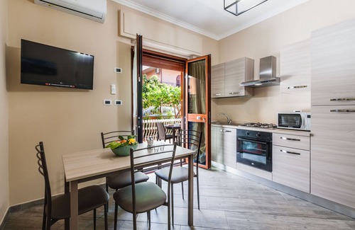Giardini Naxos Apartment | Relax at Lemon Tree Apartments with Family-Friendly Amenities