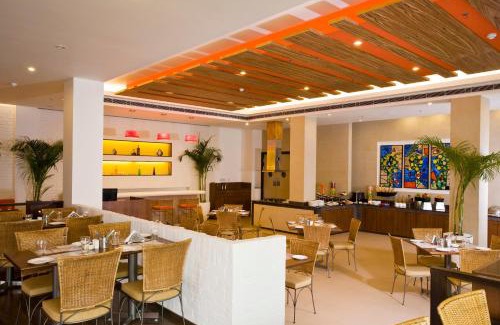Kaushambi Hotel | Relax at Lemon Tree Hotel, East Delhi Mall with Pool Access