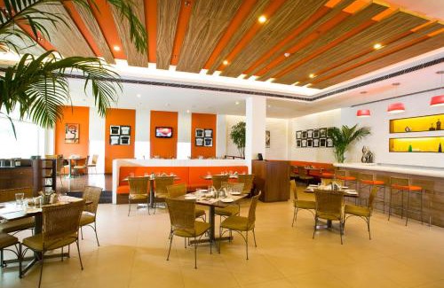Kaushambi Hotel | Relax at Lemon Tree Hotel, East Delhi Mall with Pool Access