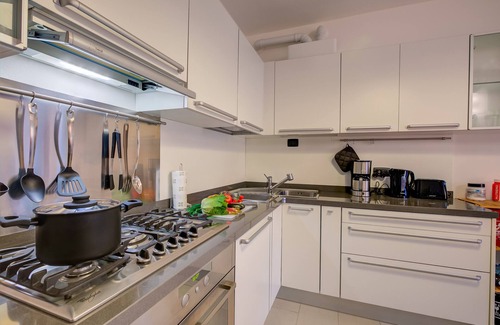 Sasso Moro Apartment | Discover Lenni Apart: Poolside Bliss in Leggiuno, Italy