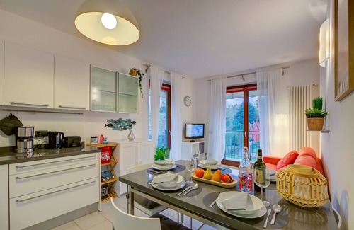 Sasso Moro Apartment | Discover Lenni Apart: Poolside Bliss in Leggiuno, Italy