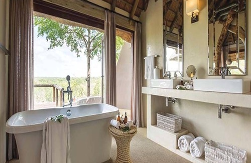 Thorny Bush Game Reserve Cabin | Elegant Leopard Hills: 5-Star Retreat with Spa & Pool