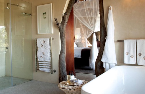 Thorny Bush Game Reserve Cabin | Elegant Leopard Hills: 5-Star Retreat with Spa & Pool