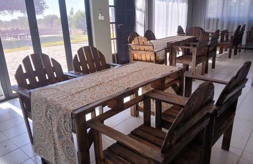 Central Cabin | Explore Leropong Manor: Top-Rated Stay with Pool & Spa