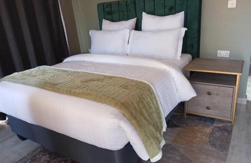 Central Cabin | Explore Leropong Manor: Top-Rated Stay with Pool & Spa
