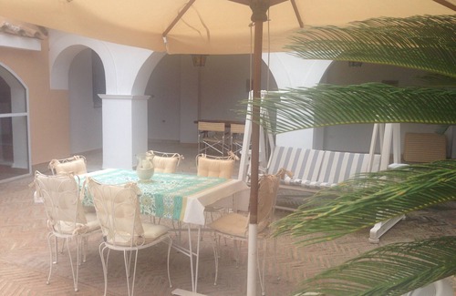 Centola Apartment | Les Amis: Coastal Retreat with Ocean View & Pool Access