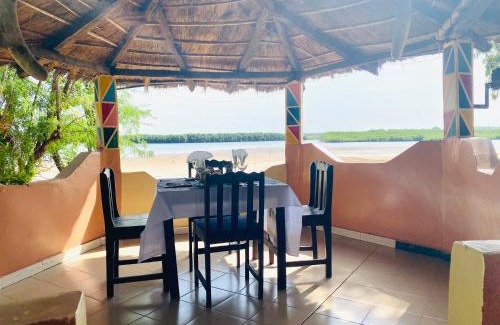 Sokone Hotel | Discover Les Calaos du Saloum: Oceanfront Retreat Awaits