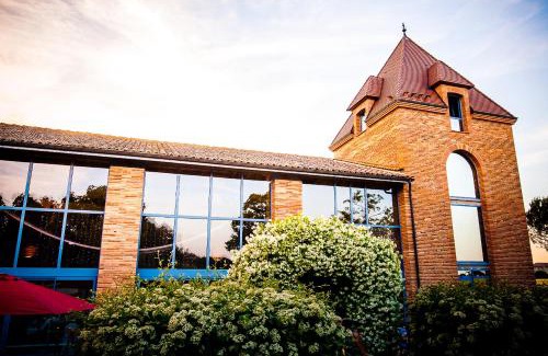 Mondonville Hotel | Unwind at Les Ecuries de la Tour with Family-Friendly Amenities