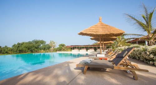 Guereo Hotel | Discover Les Manguiers de Guereo: Oceanfront Family Retreat