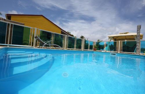 Saint-Louis House | Relax at Les Palmes du Moulin: Oceanfront with Pool & Dining