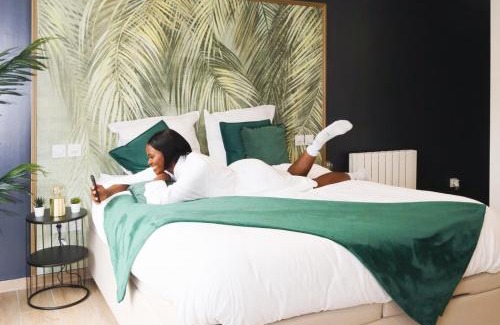 Evreux Apartment | Elegant L’Esmeralda Spa: Relaxing Getaway with Hot Tub