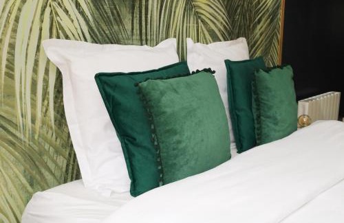 Evreux Apartment | Elegant L’Esmeralda Spa: Relaxing Getaway with Hot Tub