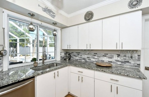 Venice House | Beachside Retreat with Heated Pool and Family Amenities
