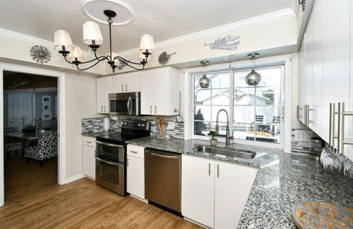 Venice House | Beachside Retreat with Heated Pool and Family Amenities
