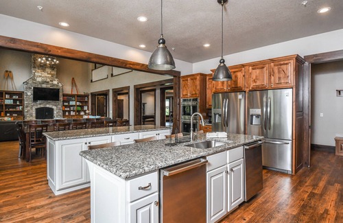 Waterfront Greens House | Unforgettable Lakefront Retreat with Pool & Hot Tubs!