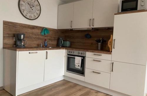 Busum Apartment | Exclusive Leuchtturm Büsum: Oceanfront with Sauna & High Ratings