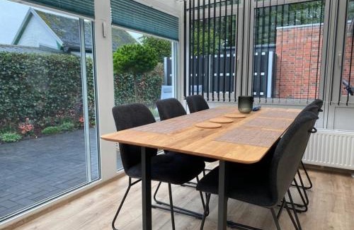 Busum Apartment | Exclusive Leuchtturm Büsum: Oceanfront with Sauna & High Ratings