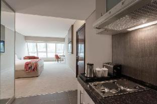 Al Wasl Apartment | Relax at Leva Hotel and Suites Near Downtown with Pool & Spa