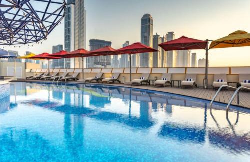 Al Wasl Apartment | Relax at Leva Hotel and Suites Near Downtown with Pool & Spa