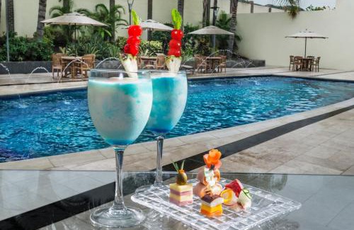 Naguanagua Hotel | Elegant Lidotel Valencia: Poolside Bliss & Family-Friendly Stay