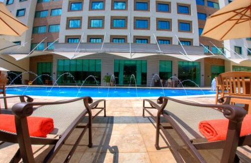 Naguanagua Hotel | Elegant Lidotel Valencia: Poolside Bliss & Family-Friendly Stay