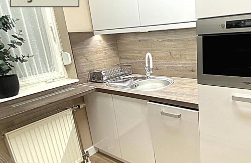 Heviz Apartment | Top-Rated Liget Hévíz Apartman: Family-Friendly Retreat