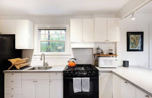 Bushrod Condo | Bright Retreat with Outdoor Space and Ocean Views