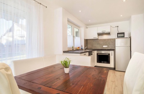 Enzisweiler Apartment | Bright and Modern Apartment “Gartenstraße” with Garden Terrace