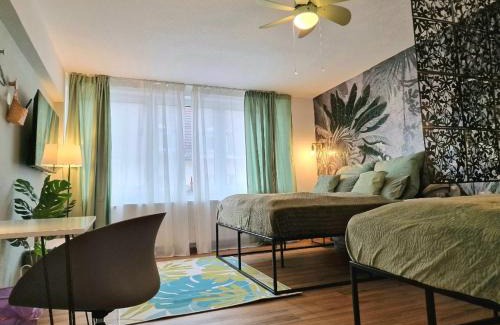 Giessen Apartment | Enchanting Jungle Suite: Netflix & Jumanji Awaits You