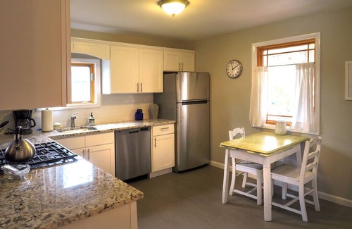 Riverhead House | Serene Retreat by the River with Private Dock and Spa