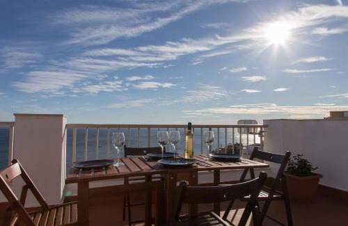 Faro de Cullera Apartment | Oceanfront Lighthouse Cullera Penthouse with Pet-Friendly Perks