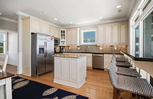 Yaupon Beach House | Oceanfront Lighthouse with Pool & Elevator Near Fishing Pier