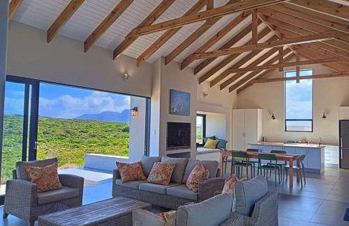 Kleinbaai Villa | Beachfront Lighthouse Villa Romansbaai with Hot Tub & More