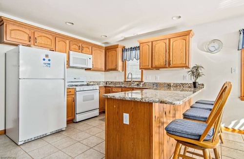 Townsend's Inlet House | Beachside Retreat: Steps from the Shore with Family Amenities