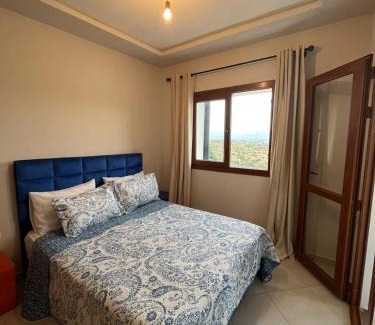 M'diq Apartment | Relax at Lilac's Garden with Pool and Ocean Views