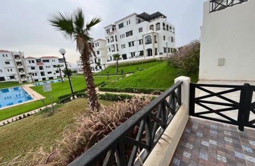 M'diq Apartment | Relax at Lilac's Garden with Pool and Ocean Views