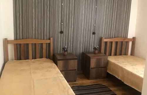 Omalo House | Discover Lileo: Family-Friendly Stay with Delicious Dining