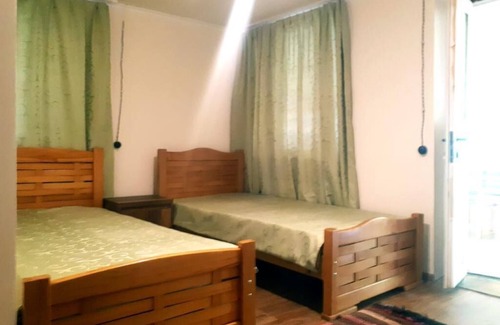 Omalo House | Discover Lileo: Family-Friendly Stay with Delicious Dining