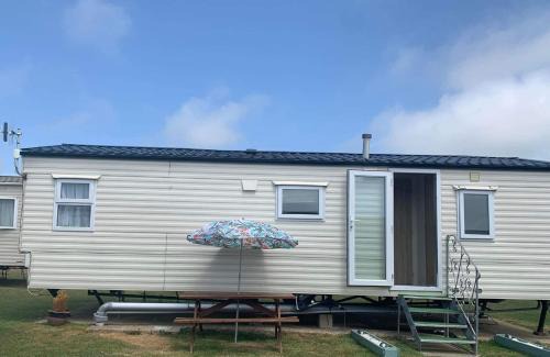 Selsey Resort | Discover LillyPad Caravan: Pet-Friendly Retreat with Pool