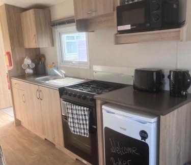 Selsey Resort | Discover LillyPad Caravan: Pet-Friendly Retreat with Pool