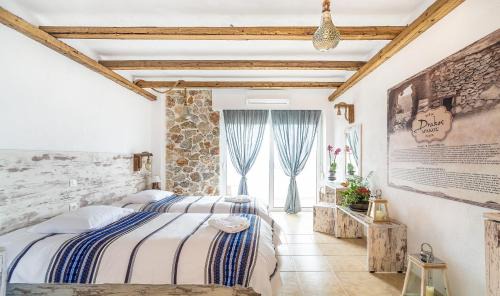 Monolithos Hotel | Oceanfront Retreat at Limeri Traditional Guest House