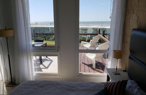 Mar de Las Pampas Apartment | Relax at Linda Bay Beach & Resort Spa - 4-Star Retreat