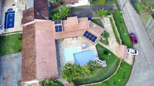 Morada da Praia House | Linda casa com piscina privativa Morada da Praia 3 quartos e 4 banheiros Aceita Pet Wi-fi na casa toda Área gourmet com churrasqueira acomoda até 15 pessoas com muito conforto 2 bicicletas disponíveis para um passeio pelo condomíno