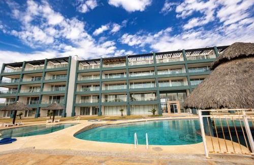 Las Conchas Apartment | Linda Vista 401: Perfect Poolside Retreat for Families