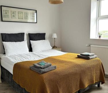 Hvolsvollur House | Discover Lindartún Guesthouse: Family-Friendly Retreat