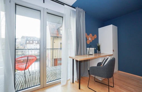 Mitte Condo | LINDE3: Relax with Balcony Views Near Old Town