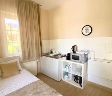 Postojna Apartment | Family-Friendly Linden Garden Apartment with Kitchen Access