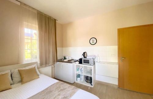 Postojna Apartment | Family-Friendly Linden Garden Apartment with Kitchen Access