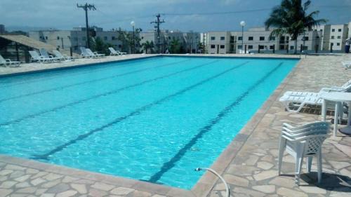 Baixo Grande Apartment | Serene Lakeview Apartment with Pool and Club Access