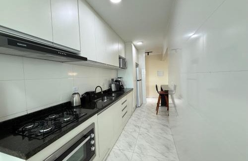Mirim Apartment | Lindo Apartamento vista mar, 2 dormitórios com suite, próximo a prefeitura praia grande